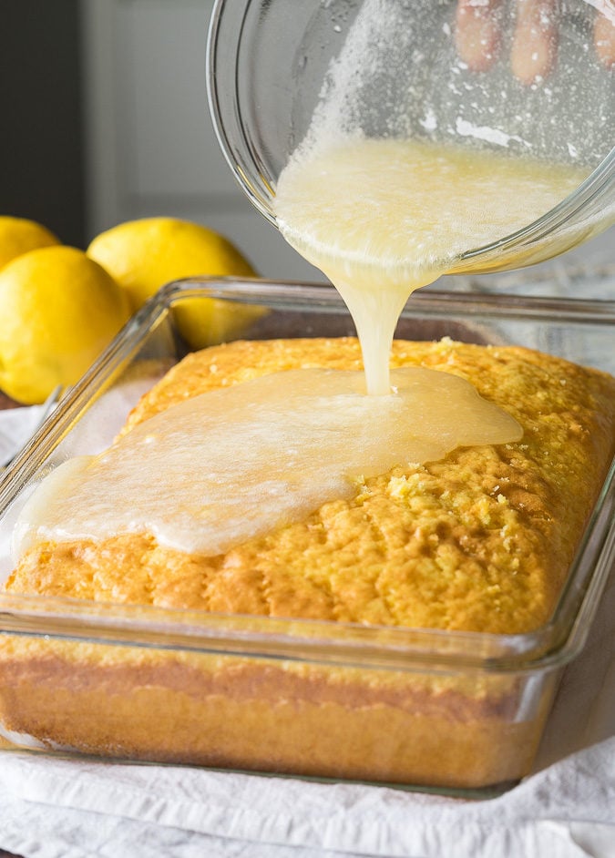This Super Easy Lemonade Cake Recipe is SO GOOD!! The trick is to let the lemonade mixture soak in and get the cake extra moist!