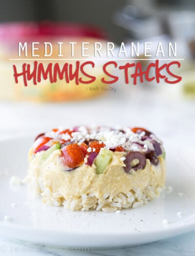 These Mediterranean Hummus Stacks are so much fun! They're filled with a simple Greek salad, classic @Sabra hummus and tender brown rice. We love serving these with a bowl of veggie chips!