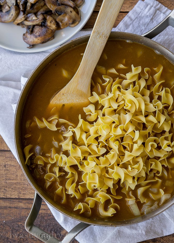 Add the dry noodles straight into the pan on this One Skillet Ground Beef Stroganoff and watch what happens!