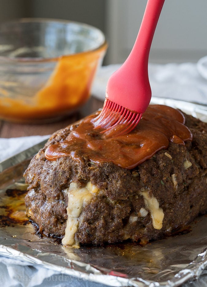 My whole family LOVES this Macaroni and Cheese Stuffed Meatloaf! It's filled with extra cheesy macaroni and the meatloaf is perfectly tender!