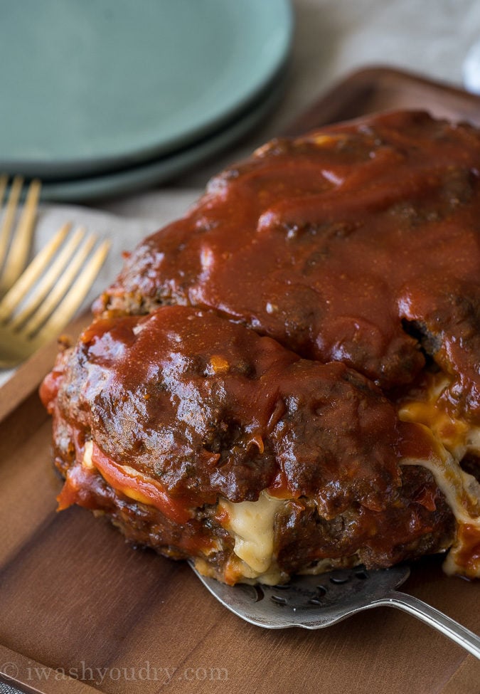 My whole family LOVES this Macaroni and Cheese Stuffed Meatloaf! It's filled with extra cheesy macaroni and the meatloaf is perfectly tender!