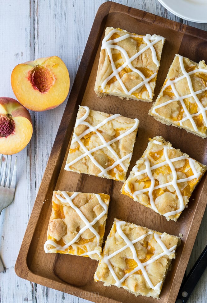 These Peaches and Cream Pie Bars are an easy dessert recipe that's perfect for a party or potluck!