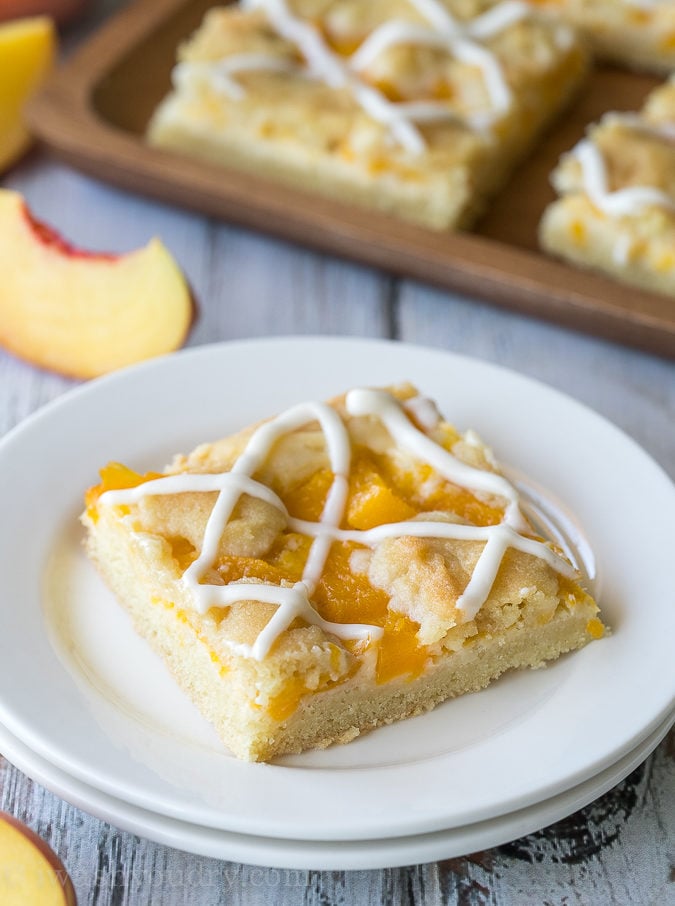 These Peaches and Cream Pie Bars are an easy dessert recipe that's perfect for a party or potluck!