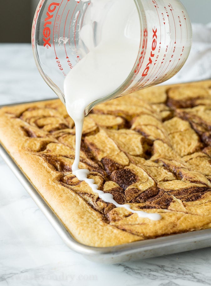 This super easy Cinnamon Roll Sheet Cake is a perfect dessert for potlucks or parties! So easy and seriously so delicious!