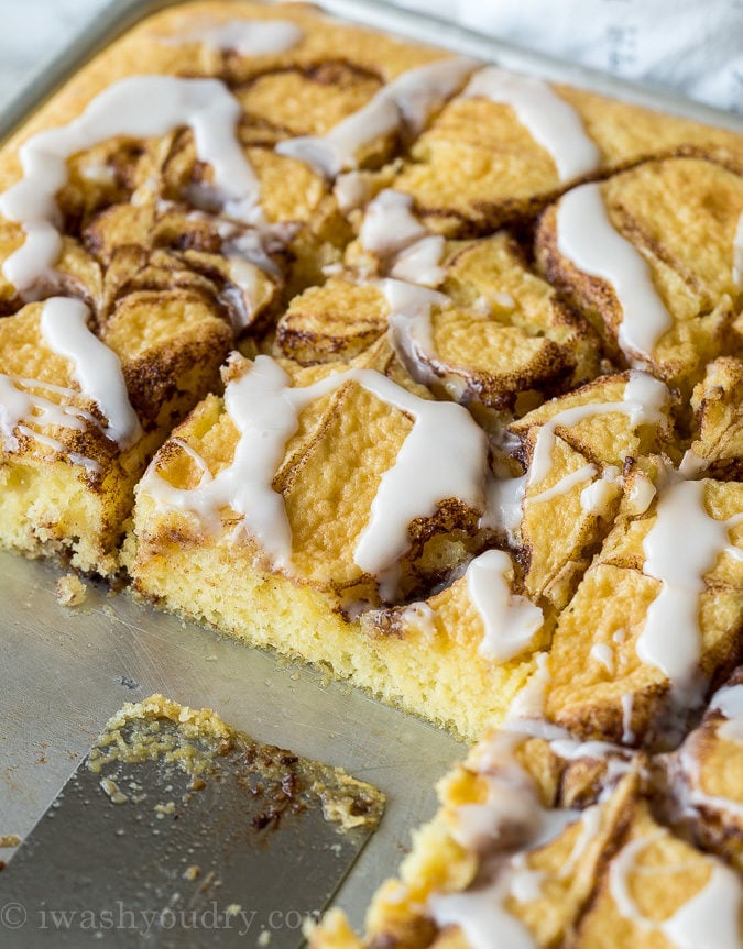 This super easy Cinnamon Roll Sheet Cake is a perfect dessert for potlucks or parties! So easy and seriously so delicious!