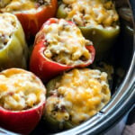 These easy Crock Pot Stuffed Peppers are filled with ground beef and such an easy recipe to follow!