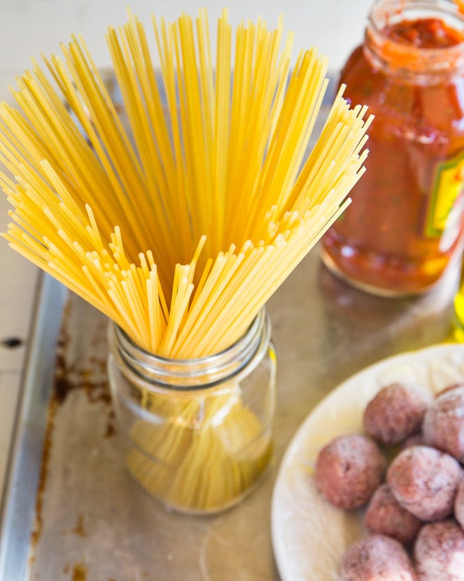 Instant Pot Spaghetti and Meatballs - everyone's favorite comfort food gets a quick and easy makeover with just 3 main ingredients and less than 30 minutes!