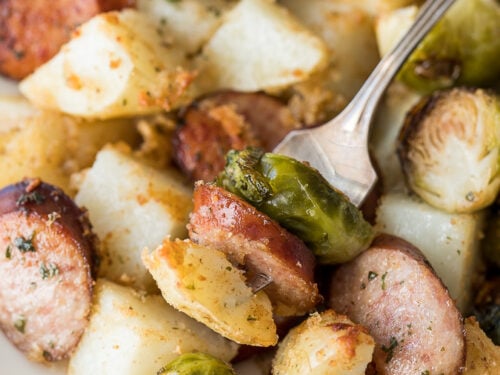 This Parmesan Roasted Sheet Pan Dinner is a complete meal all made on one pan! My kids go crazy for this simple dinner recipe!