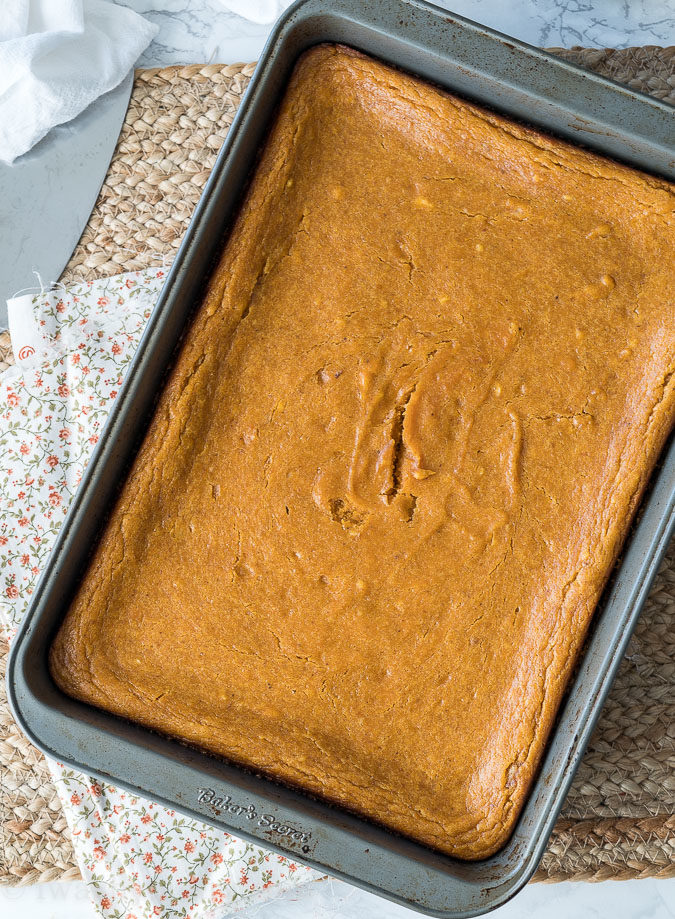 My family goes crazy for this super easy Pumpkin Gooey Cake! It's a must for Thanksgiving!
