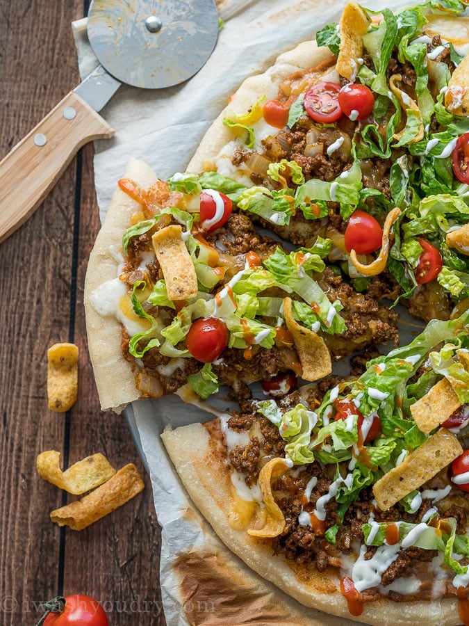 You're going to LOVE this Super Easy Taco Pizza! It's the best of both worlds!