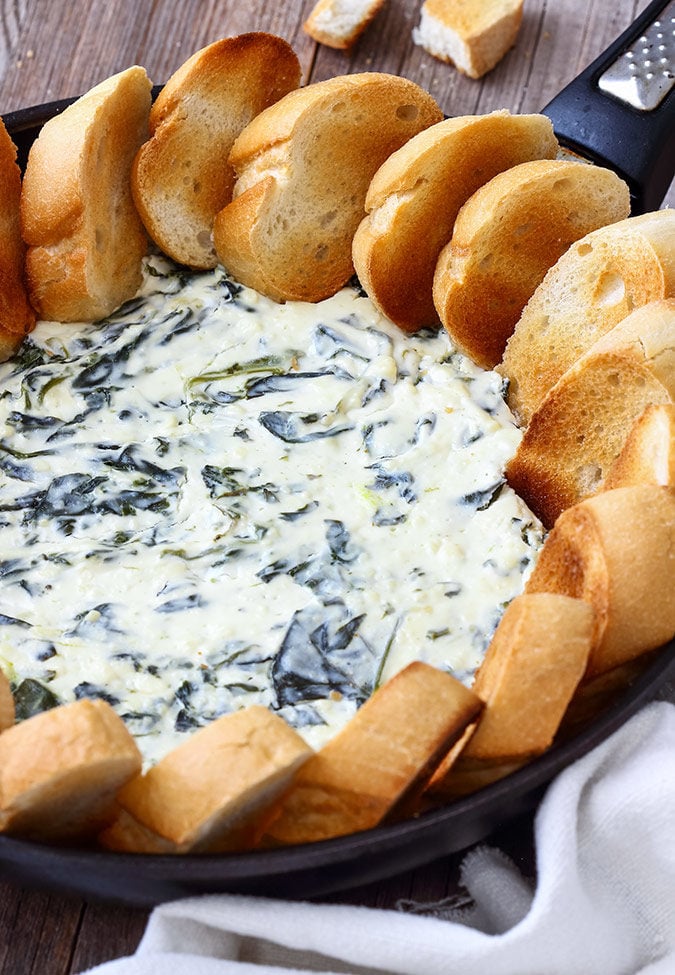 This Skillet Cheese Dip is loaded with feta, cream cheese and sautéed spinach!