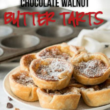 These Chocolate Walnut Butter Tarts are filled with a buttery brown sugar mixture and stuffed with chocolate and walnuts! This Canadian dessert is a must-make!