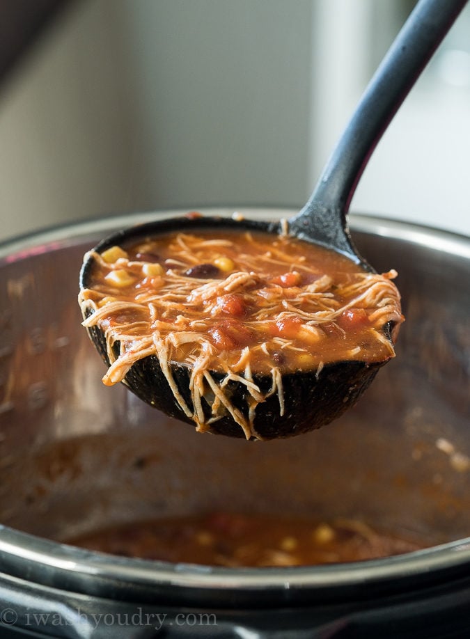 This Instant Pot Chicken Taco Soup recipe is seriously so easy to make! My kids devoured this!