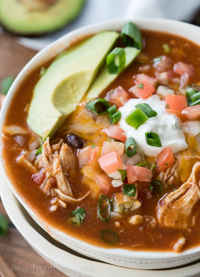 This Instant Pot Chicken Taco Soup recipe is seriously so easy to make! My kids devoured this!