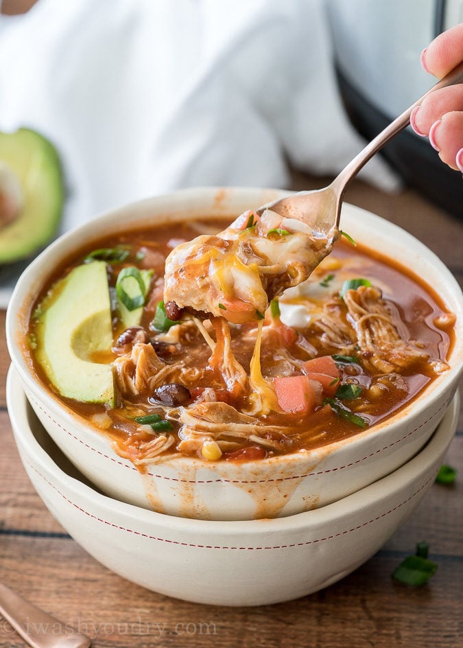 This Instant Pot Chicken Taco Soup recipe is seriously so easy to make! My kids devoured this!