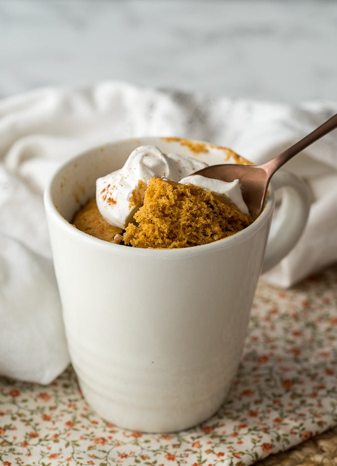 I LOVE this moist and flavorful pumpkin mug cake recipe! It's a quick and easy dessert to whip up!