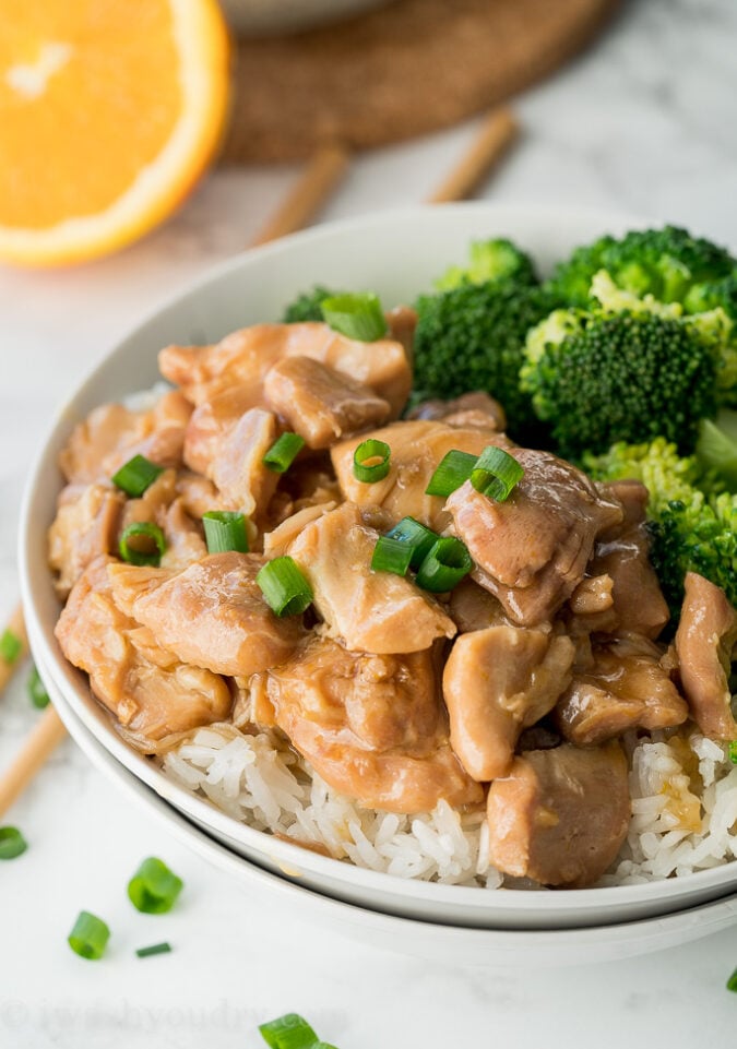 Deliciously sweet and sticky Orange Chicken made in the Instant Pot WITH rice too! A complete meal that my whole family LOVES!