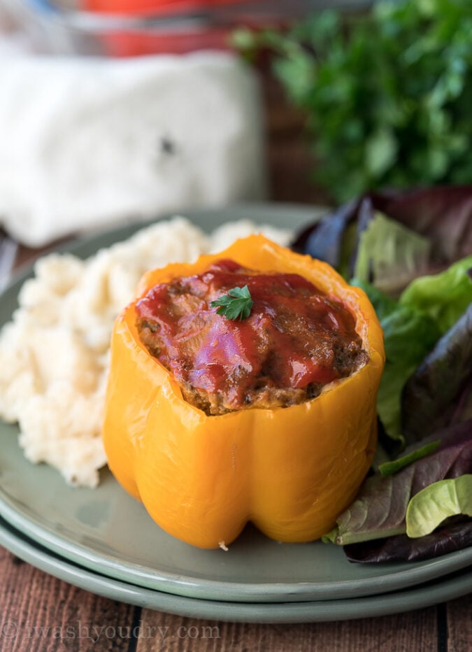 WINNER! My family LOVED this Slow Cooker Meatloaf Stuffed Peppers with Mashed Potatoes! So easy and a complete dinner in one pot! 