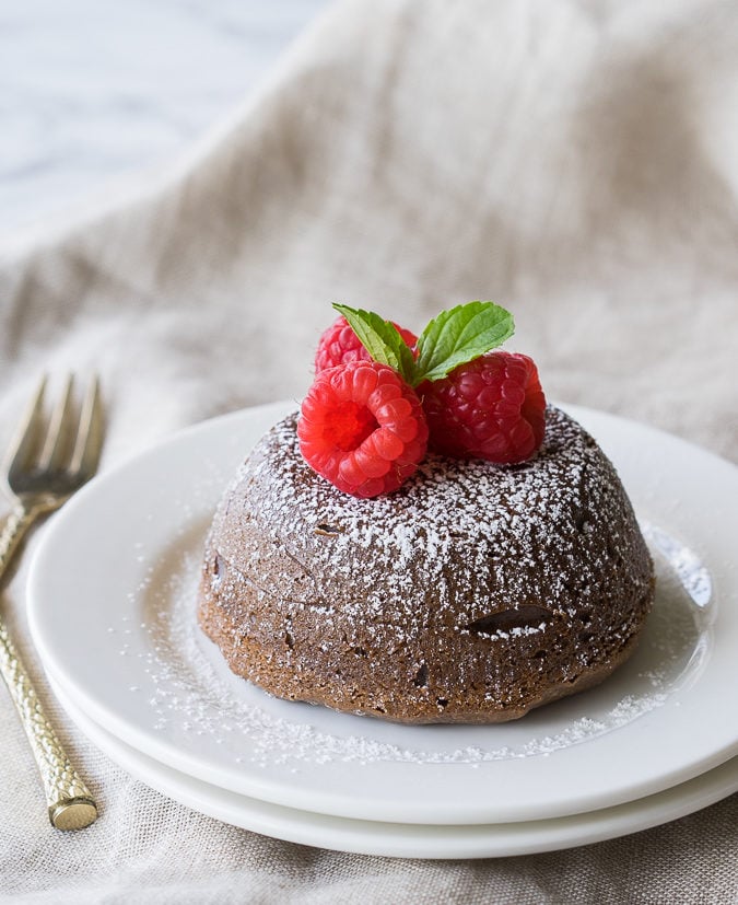 These Chocolate Avocado Molten Lava Cakes are infused with green avocados, for a healthy fat that tastes delicious and is easy to make!