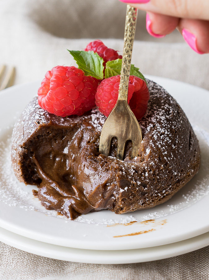 These Chocolate Avocado Molten Lava Cakes are infused with green avocados, for a healthy fat that tastes delicious and is easy to make!