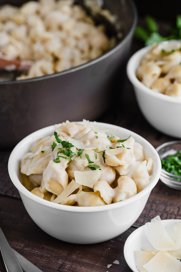 This One Skillet Mac and Cheese is loaded with 3 different flavors of cheese and ready in under 30 minutes! Super kid friendly dinner that even adults LOVE!