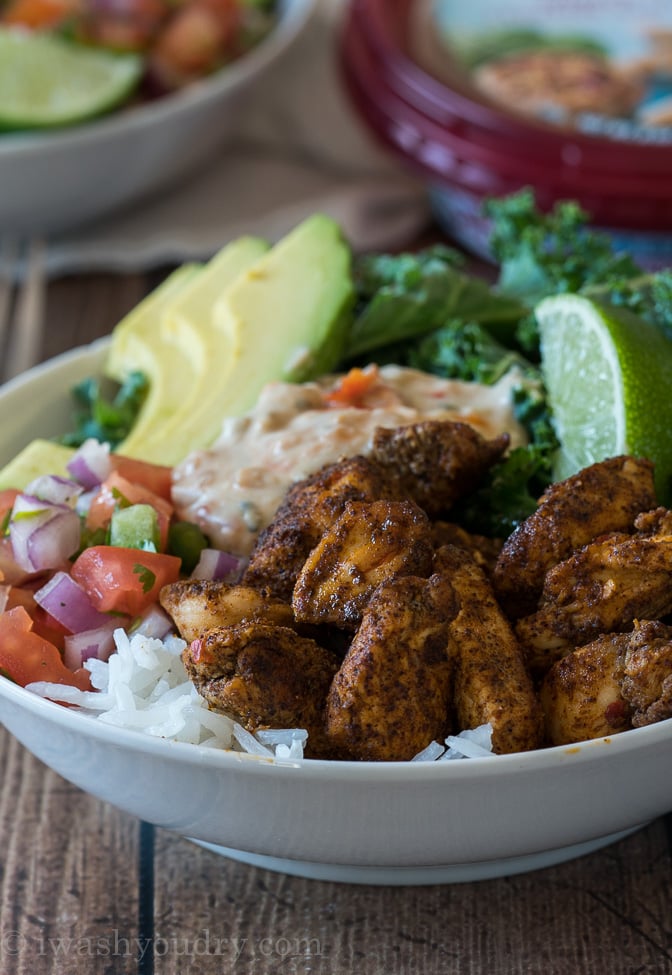 These Spicy Chicken Burrito Rice Bowls are a quick, fun and tasty weeknight dinner recipe!