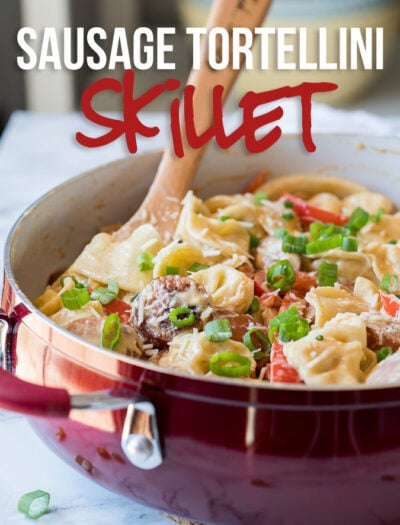 OMG! This Creamy Sausage Tortellini Skillet is a super quick weeknight dinner recipe that my whole family loves! It's on our weekly dinner menu now!