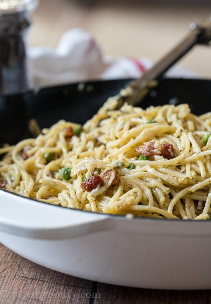 Toss the tender spaghetti in with the bacon and peas for an easy weeknight dinner!