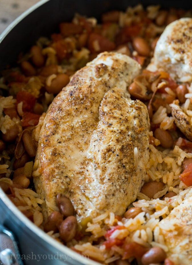 Once you add in the rice, salsa and chicken broth, place the chicken breasts back in, bring to a boil and then cover.