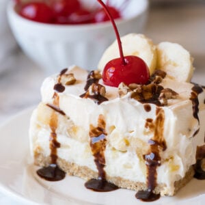 This No Bake Banana Split Cake is the perfect cool and creamy treat for all your summer potlucks and bbqs!