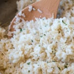 My kids LOVED this creamy Garlic Parmesan Rice side dish recipe! So quick and easy to make!