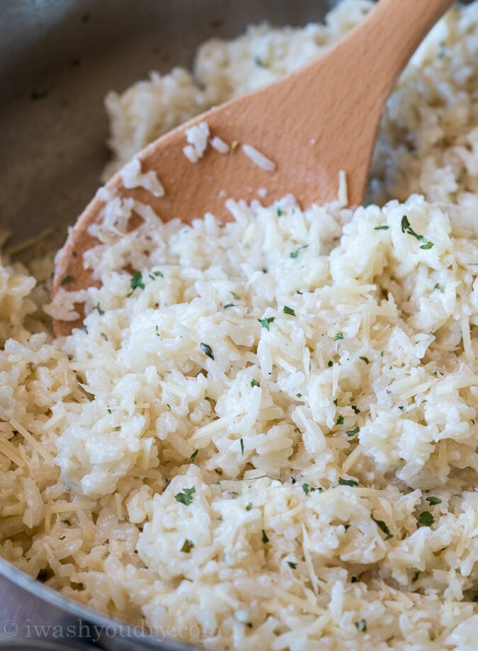 My kids LOVED this creamy Garlic Parmesan Rice side dish recipe! So quick and easy to make!