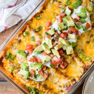 Once your beef enchiladas are done, top with all your favorite taco toppings and enjoy!