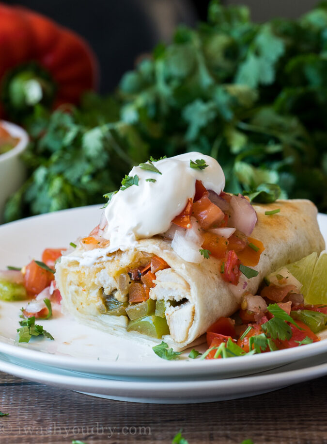 Load up your Baked Chicken Fajita Burritos with all your favorite fajita toppings!