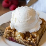 The swirl of cheesecake in this raspberry brown sugar cake is simply irresistible!