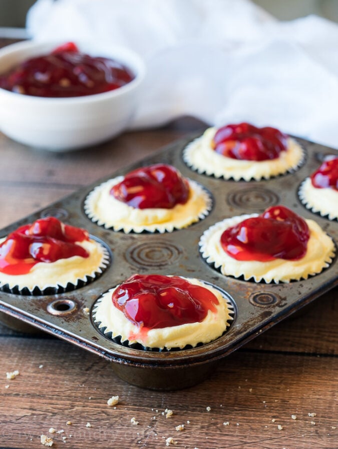 WOW! These No Bake Cherry Cheesecakes are made in a muffin pan so they are perfect for portion control and parties! So quick and so easy to make!