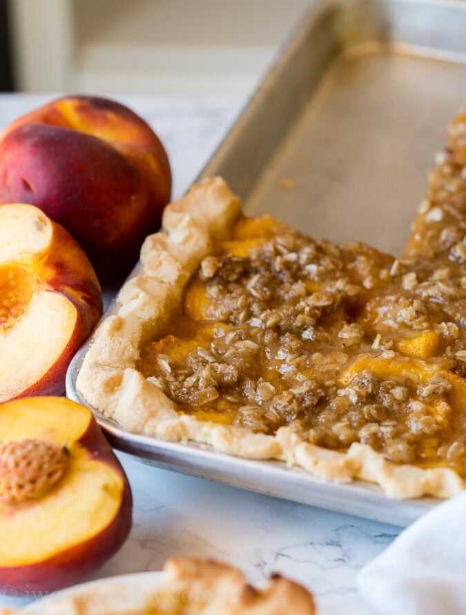 This Peach Slab Pie recipe is the perfect dessert for potlucks since it can easily serve a crowd!