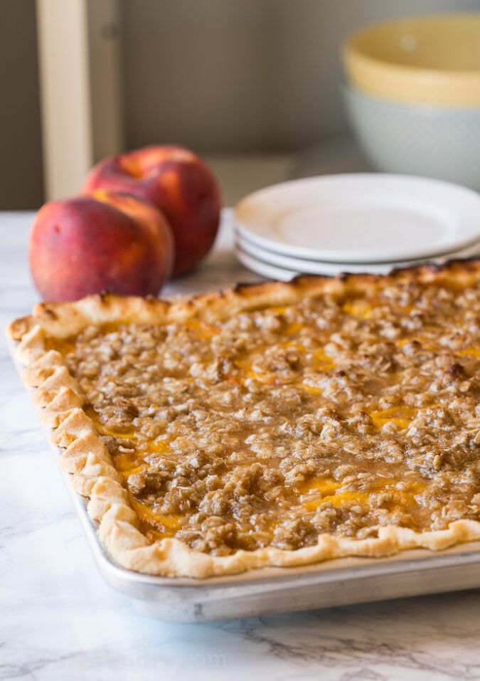 Create the perfect end of summer dessert with this Peach Slab Pie!