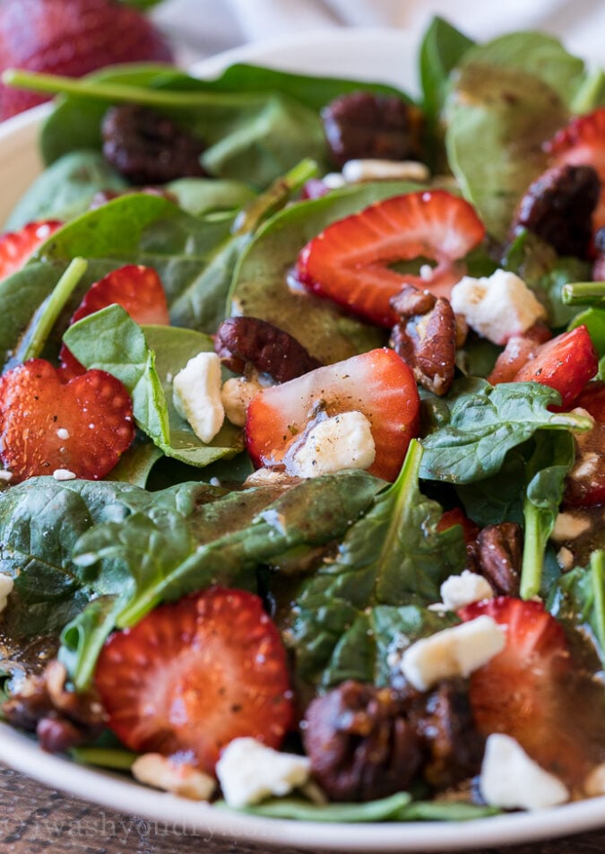 OMG! This Strawberry Spinach Salad with candied pecans was out of this world good! So quick and easy to make too!
