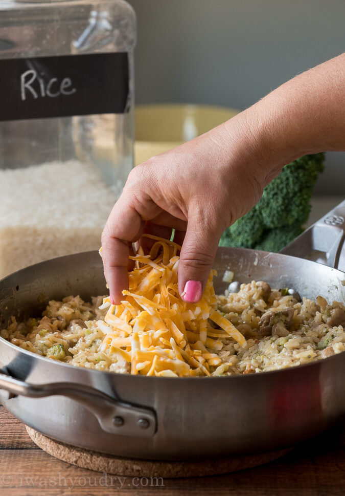 Sprinkle the remaining cheese over the top of the creamy rice mixture and place the lid back on until the cheese is melted.