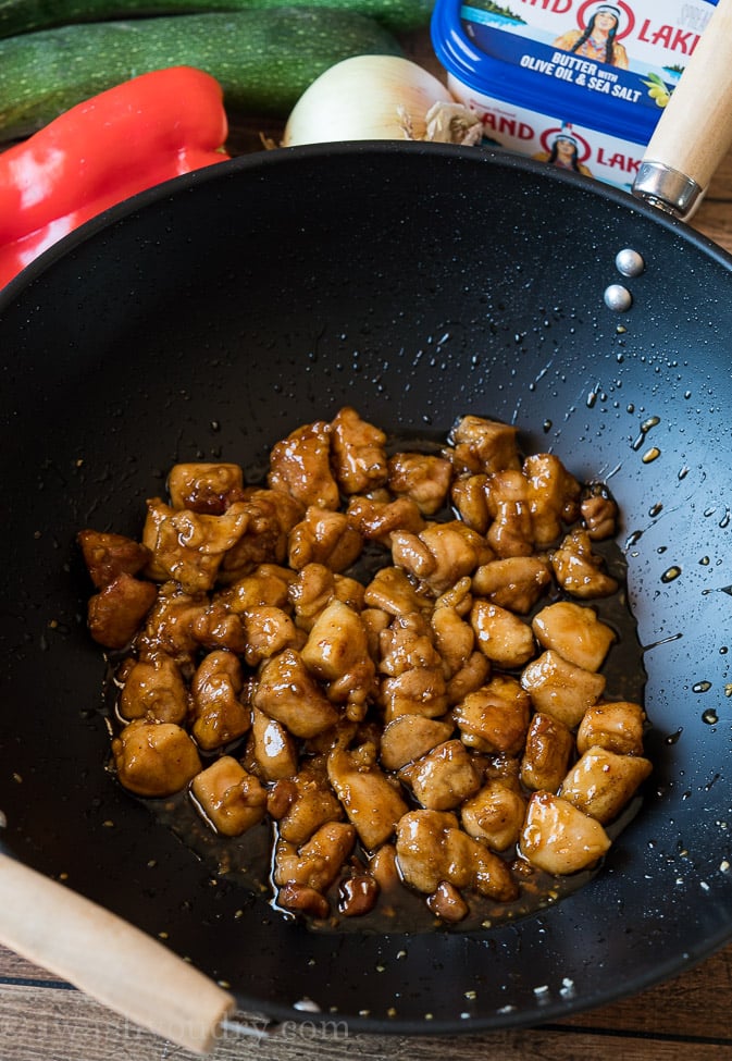 Brown the chicken in a skillet or wok over high heat to give it a nice golden brown exterior.