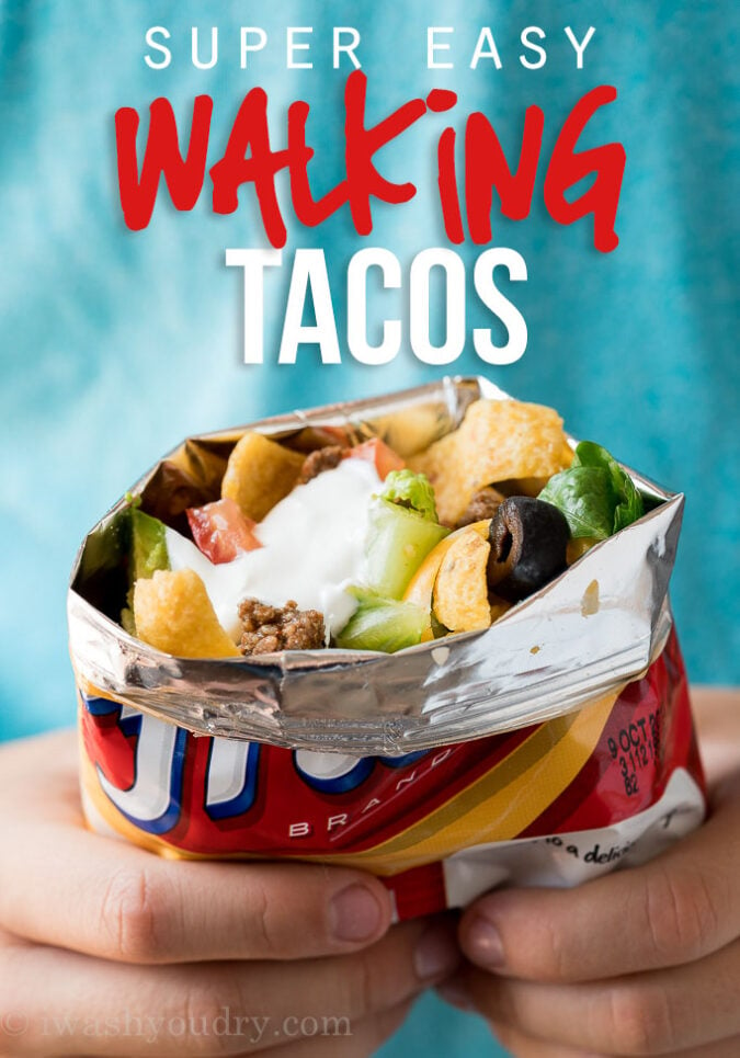 This super easy Walking Taco Recipe, or sometimes referred to as "Frito Pie" is basically everything you love about tacos, but made portable and perfect for camping or outdoor parties! Kids LOVE these and there are less dishes to clean up afterwards!