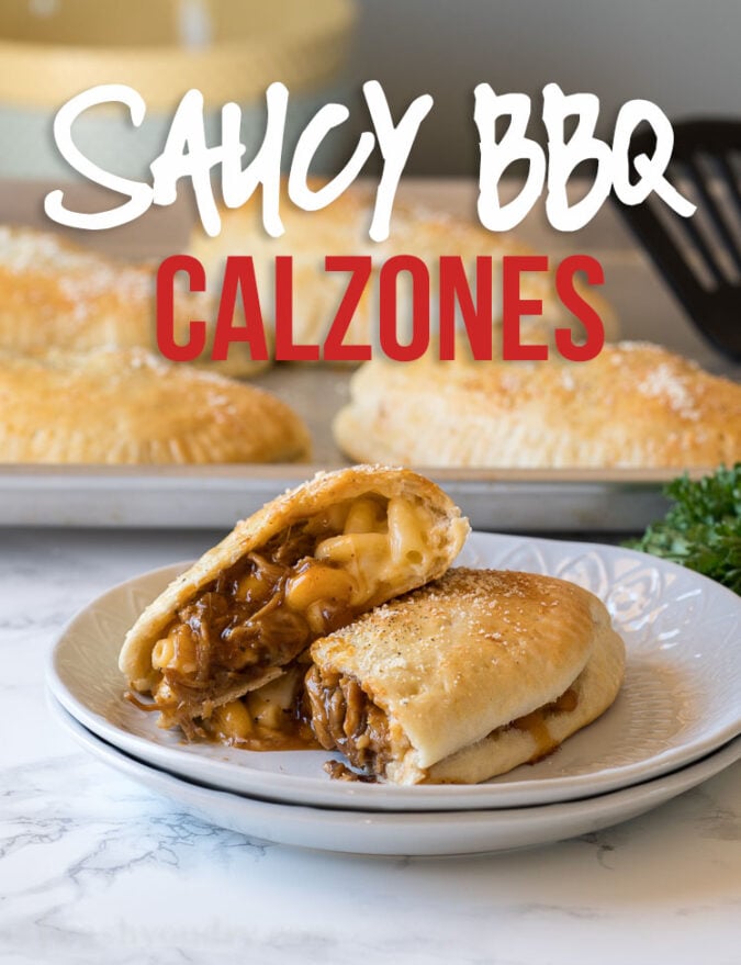 YUM! These Cheesy BBQ Pork Calzones are stuffed with extra cheesy macaroni and cheese, saucy shredded pork and baked until golden brown.