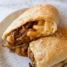 OMG! These Cheesy BBQ Pork Calzones are everything you love about good old barbecue wrapped up in a warm and crispy calzone!