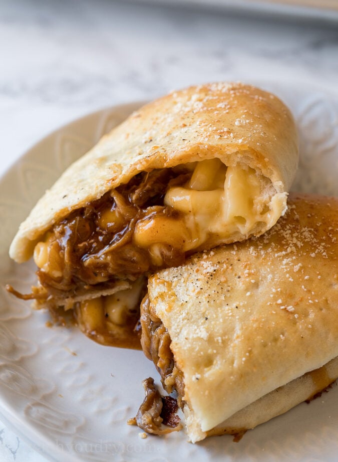 OMG! These Cheesy BBQ Pork Calzones are everything you love about good old barbecue wrapped up in a warm and crispy calzone!