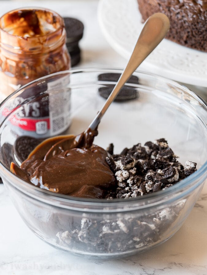 Mix up some crushed up Oreos and hot fudge to create a gooey and crunchy filling to your homemade ice cream cake.