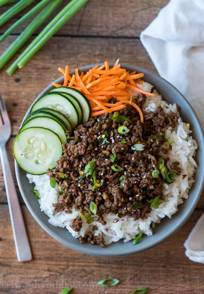 Serve your Korean Ground Beef and Rice Bowl with sliced cucumbers and matchstick carrots for a complete dinner!