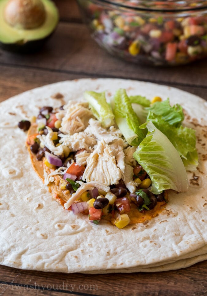 Layer all your ingredients into the center of your tortilla, then fold up like you would a burrito.