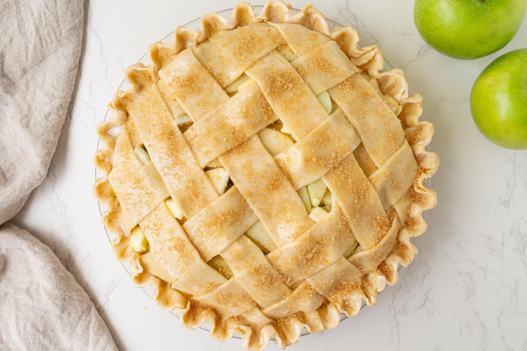 unbaked apple pie with lattice top.