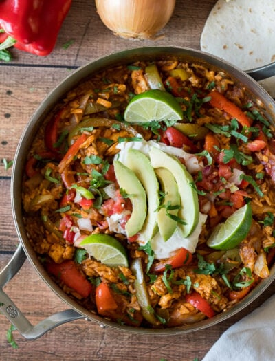 Serve this super easy Chicken Fajita Rice Skillet in tortillas, over lettuce or wrapped up in a burrito. Either way is mega delicious!